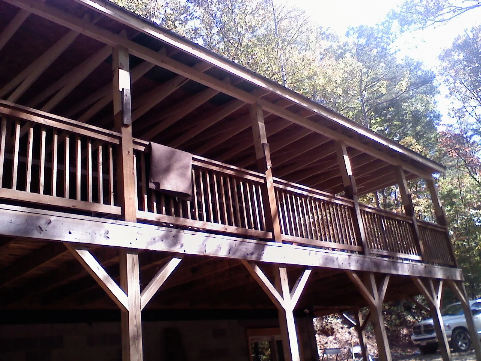 Timber framing under a new elevated porch and deck — Roof Leak Repair in Malaga by Roofing Brothers
